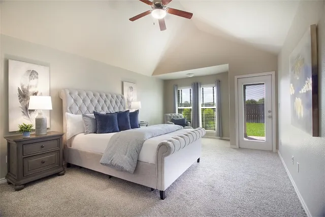 a bed room with a bed and a chandelier