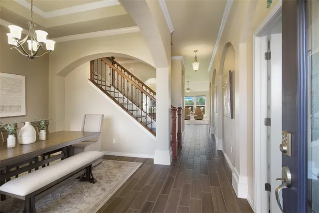 a very nice looking living room with wooden floor
