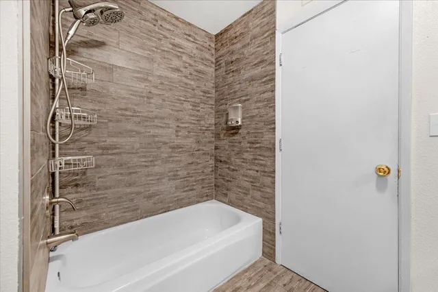 a bathroom with a bathtub