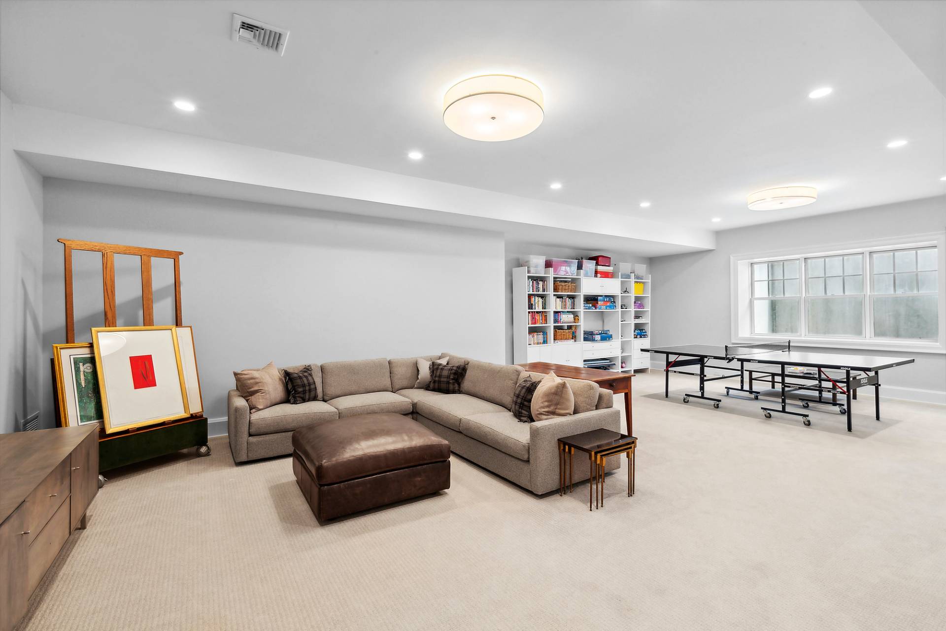 40 Roxbury Lane Wainscott, NY 11975 - Photo 22 of 29 a living room with furniture and a window