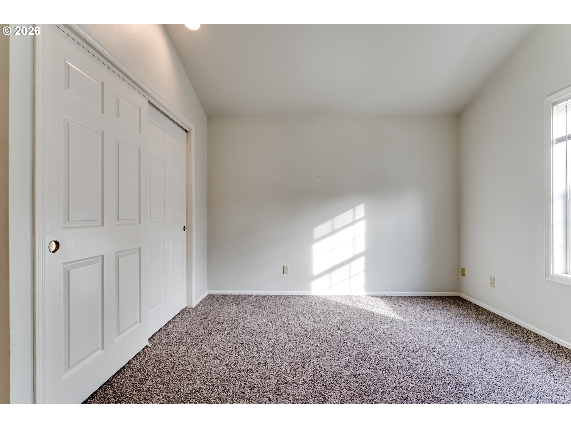 951 West 27th Avenue Eugene, OR 97405 - Photo 24 of 34 a view of an empty room and window