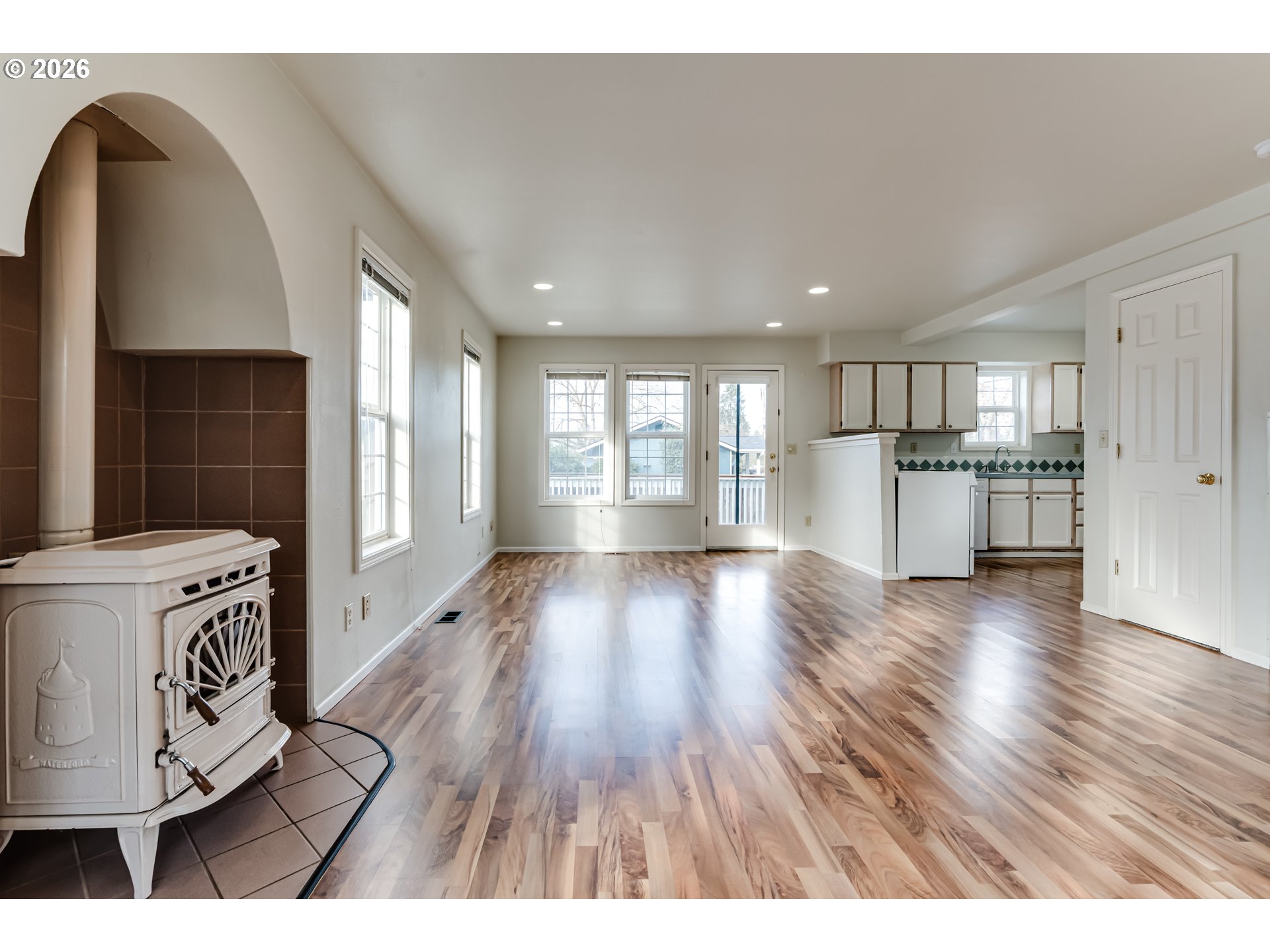 951 West 27th Avenue Eugene, OR 97405 - Photo 9 of 34 a open kitchen with a sink and refrigerator