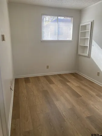 an empty room with windows