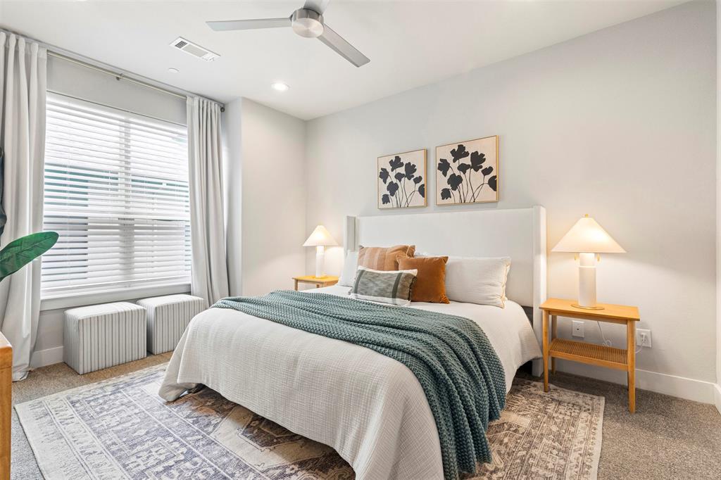 4906 Live Oak Street, Unit 7 Dallas, TX 75206 - Photo 6 of 19 a bedroom with a bed and a window