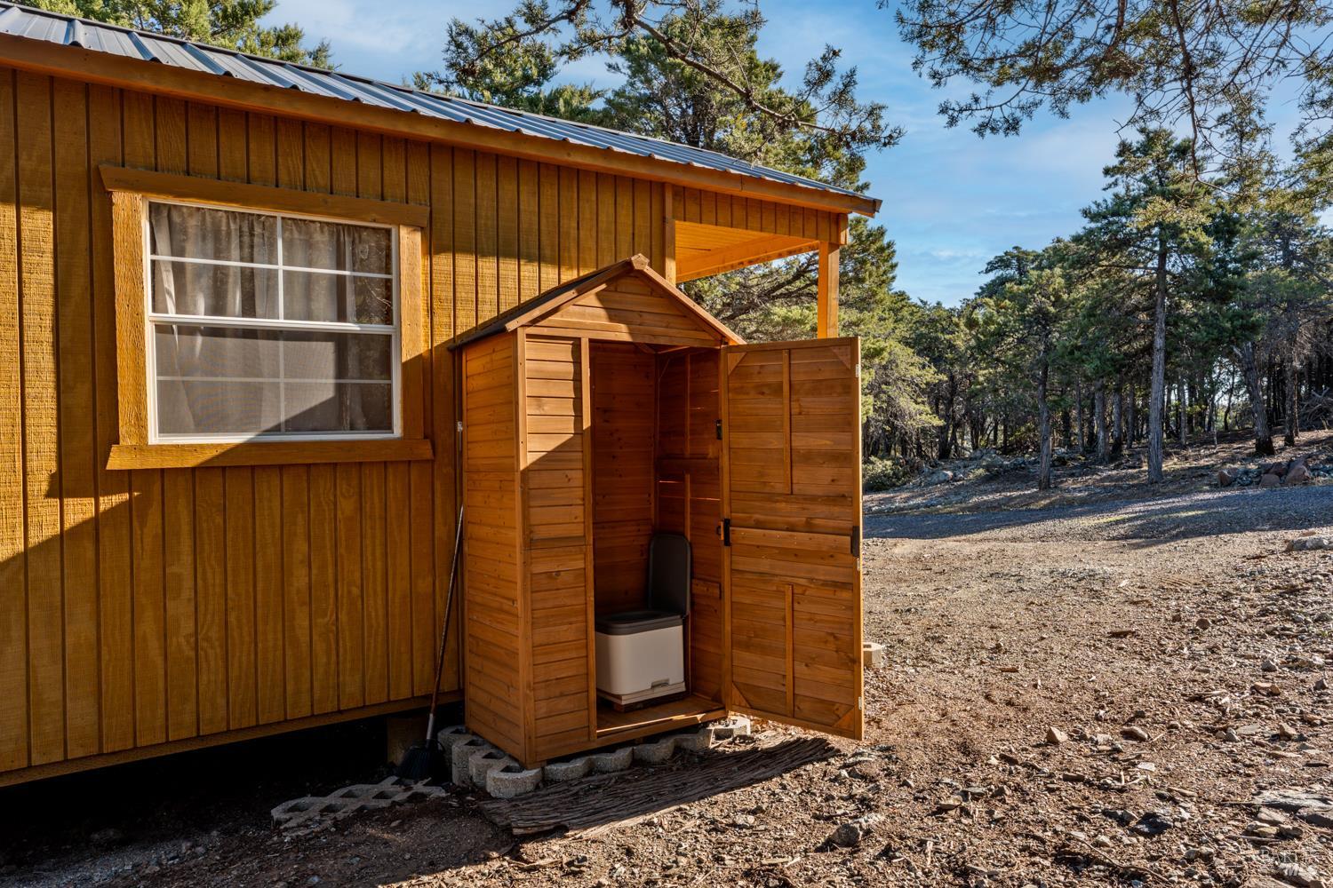 6775 County Road 110 Hopland, CA 95449 - Photo 15 of 53 a view of a small house with backyard