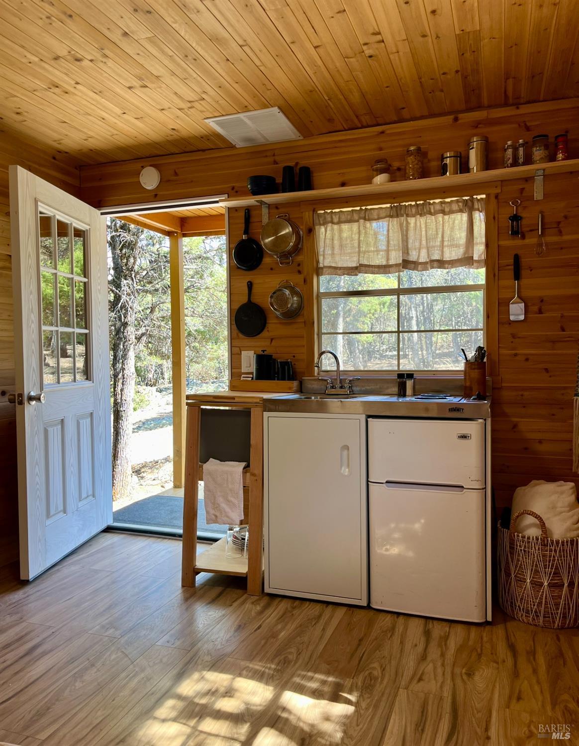 6775 County Road 110 Hopland, CA 95449 - Photo 45 of 53 a kitchen with granite countertop a stove a sink and a refrigerator