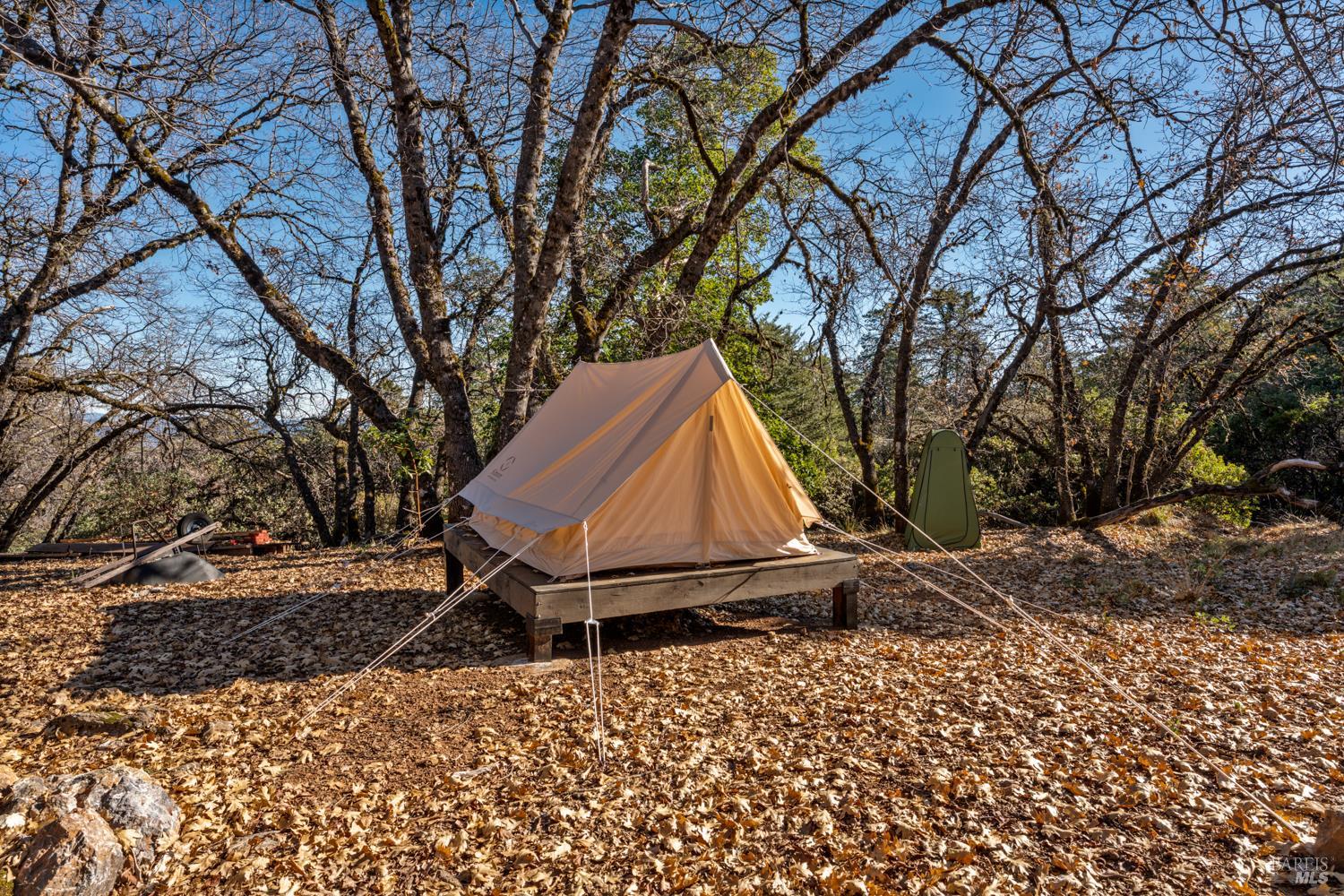 6775 County Road 110 Hopland, CA 95449 - Photo 5 of 53 a backyard of a house with table and chairs