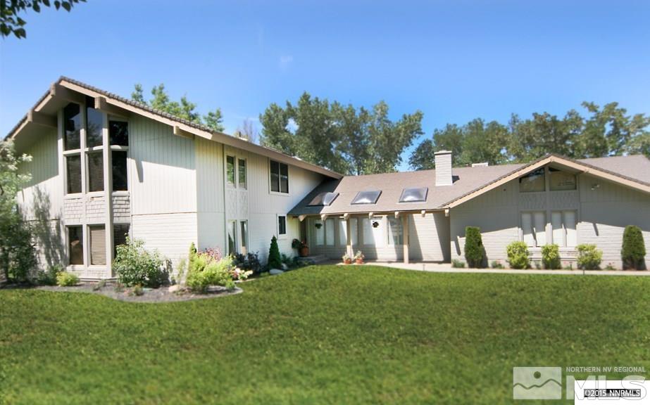 1420 Eli Drive Reno, NV 89511 - Photo 1 of 1 a front view of a house with a yard