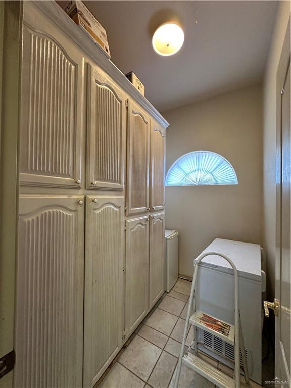 1215 South Tower Road Alamo, TX 78516 - Photo 15 of 41 a view of a hallway with entryway wooden floor and front door