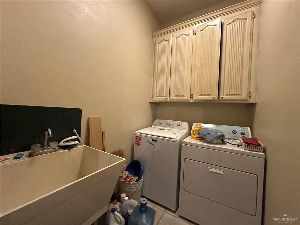 1215 South Tower Road Alamo, TX 78516 - Photo 30 of 41 a room with storage and utility