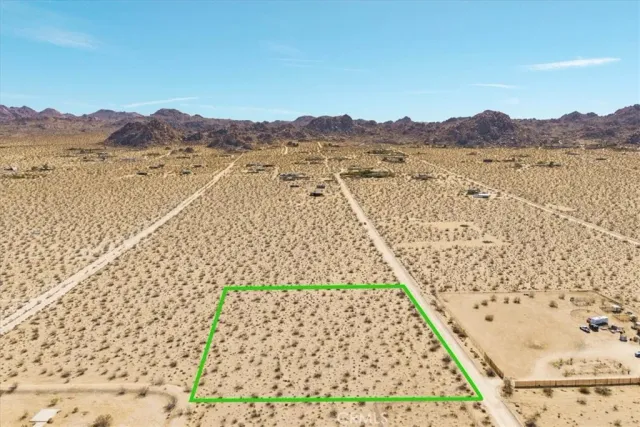 a view of balcony with a lake and mountain view