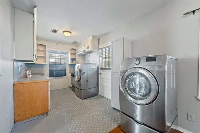 a view of kitchen and washer and dryer