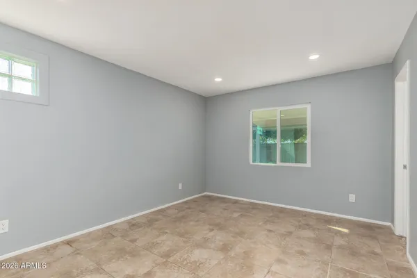 an empty room with windows