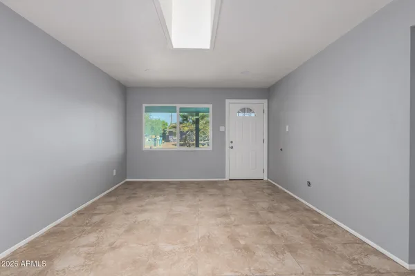 an empty room with windows