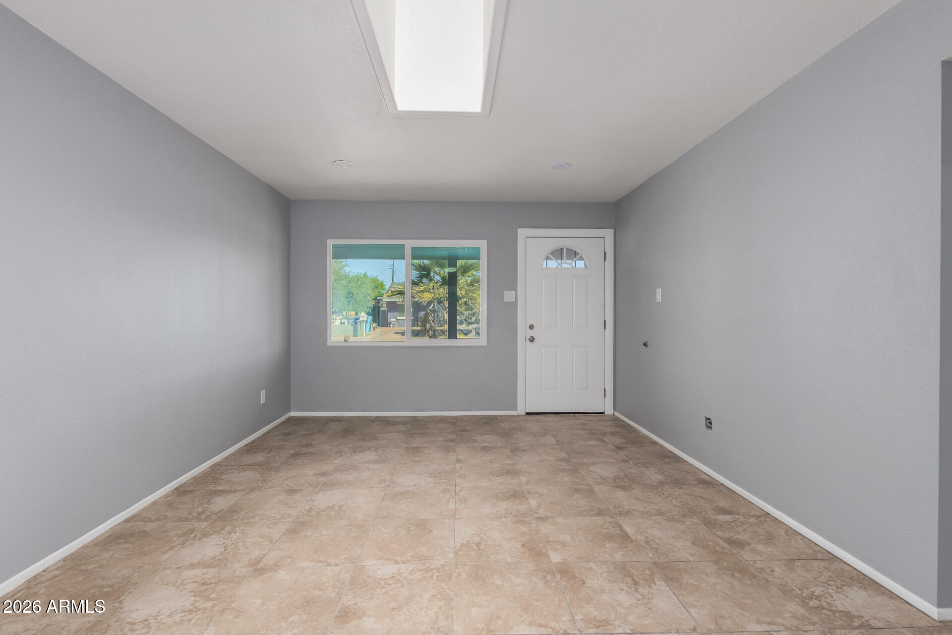 3802 North 79th Avenue Phoenix, AZ 85033 - Photo 19 of 28 an empty room with windows