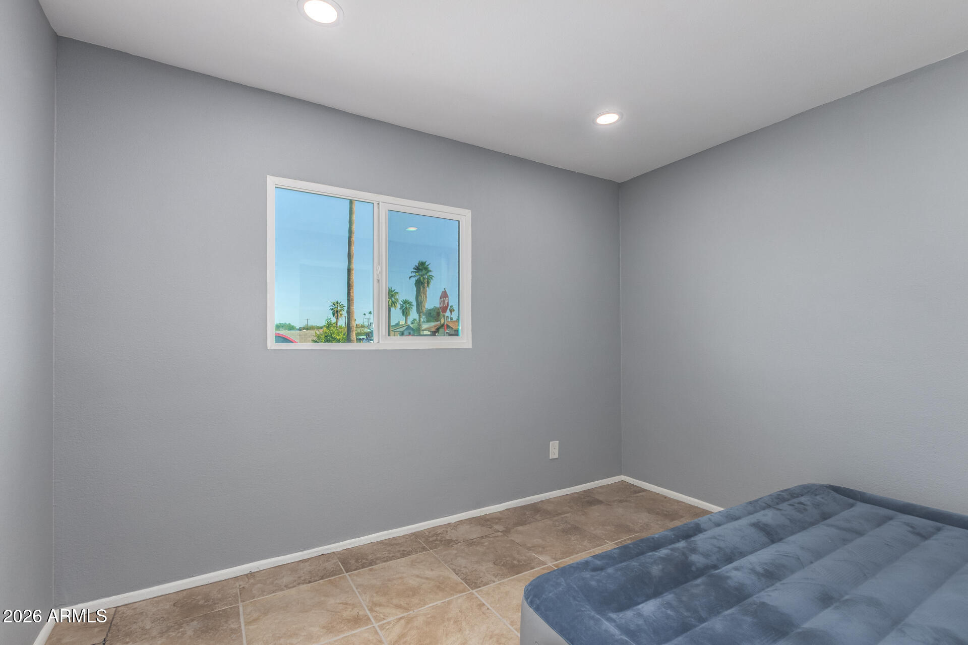 3802 North 79th Avenue Phoenix, AZ 85033 - Photo 21 of 28 an empty room with windows