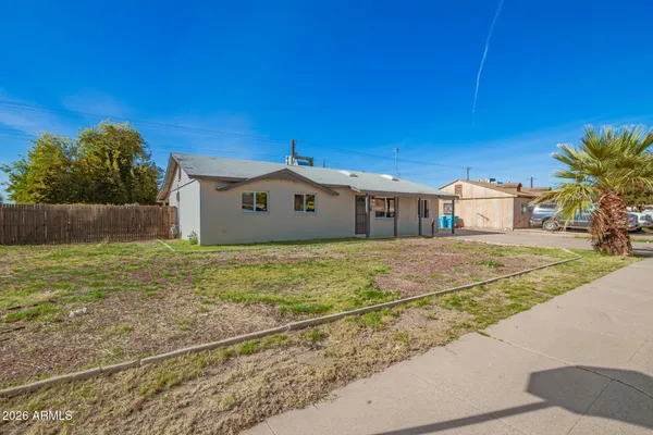 a front view of house with yard