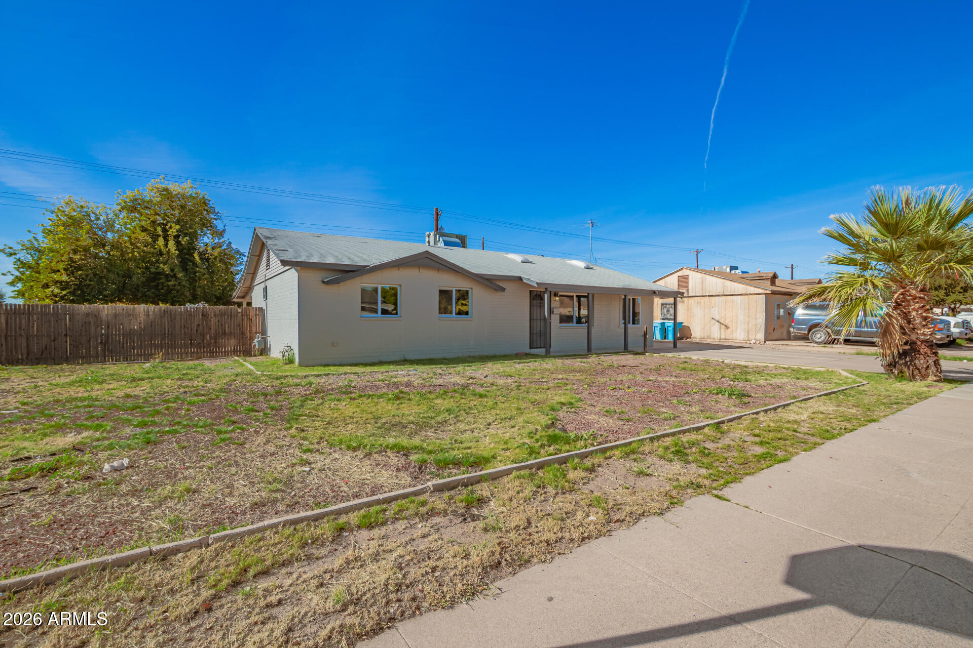 3802 North 79th Avenue Phoenix, AZ 85033 - Photo 3 of 28 a front view of house with yard