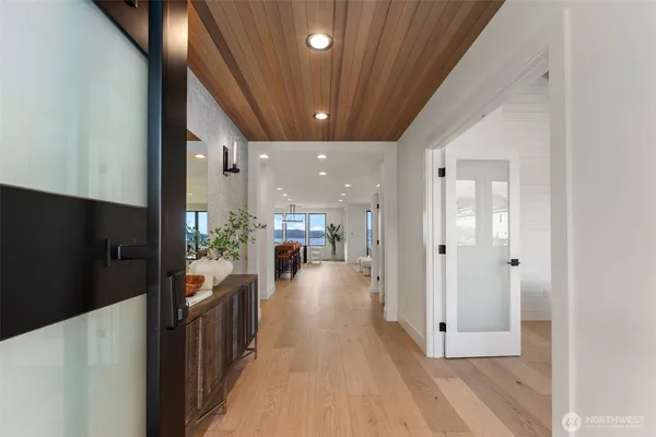a view of a hallway with living room