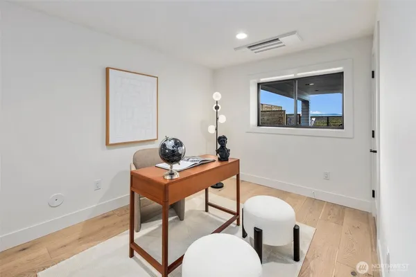 a view of a room with a large window