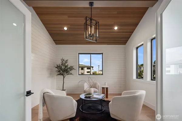 a living room with furniture and window