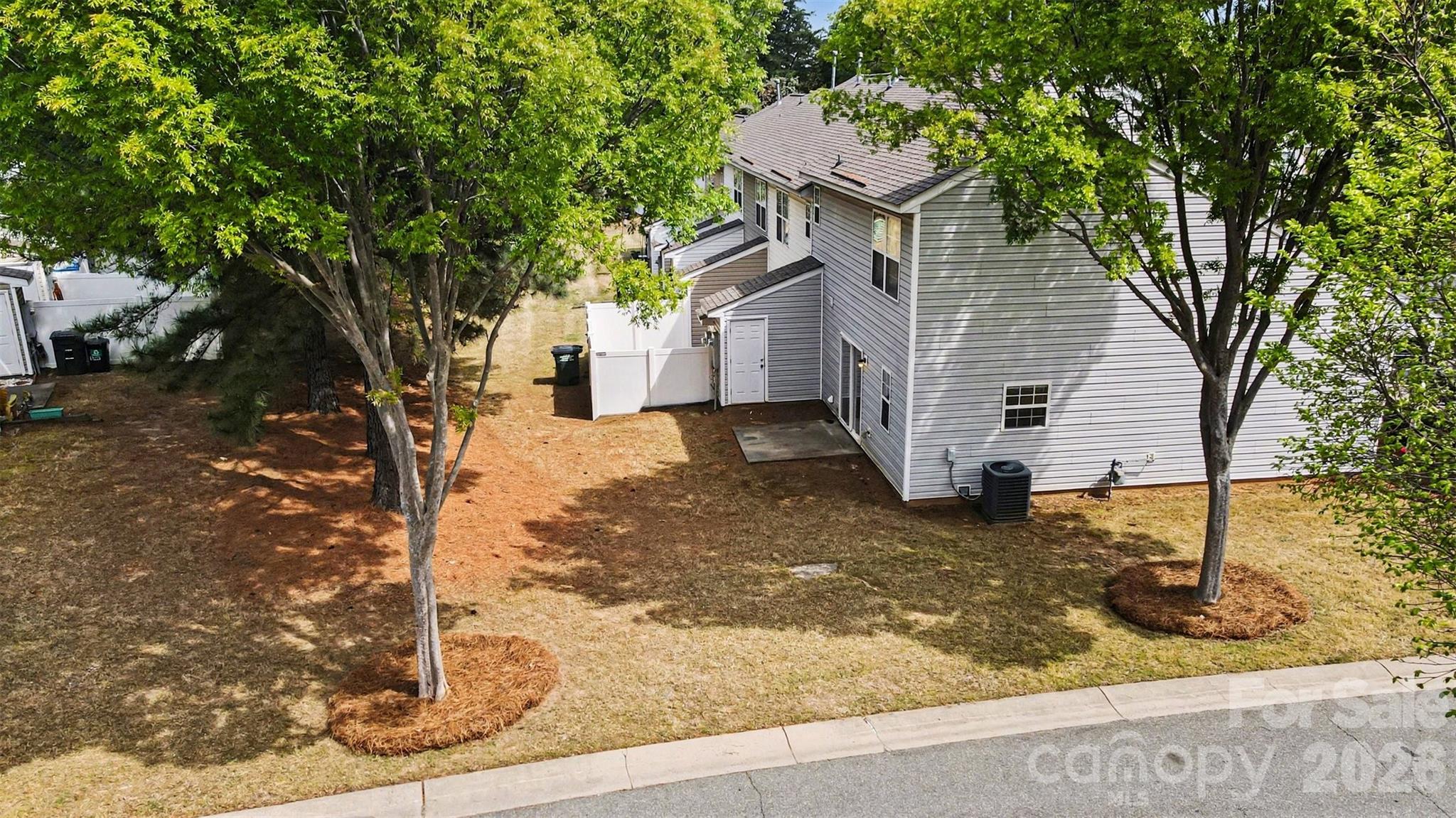 3201 Blythe Ridge Court Charlotte, NC 28213 - Photo 29 of 34 a view of a house with a yard