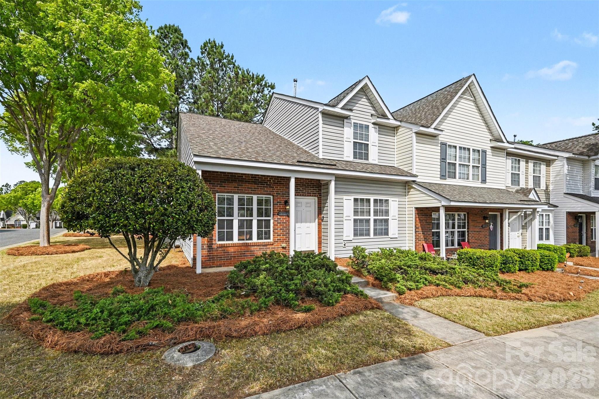 3201 Blythe Ridge Court Charlotte, NC 28213 - Photo 3 of 34 a front view of a house with garden