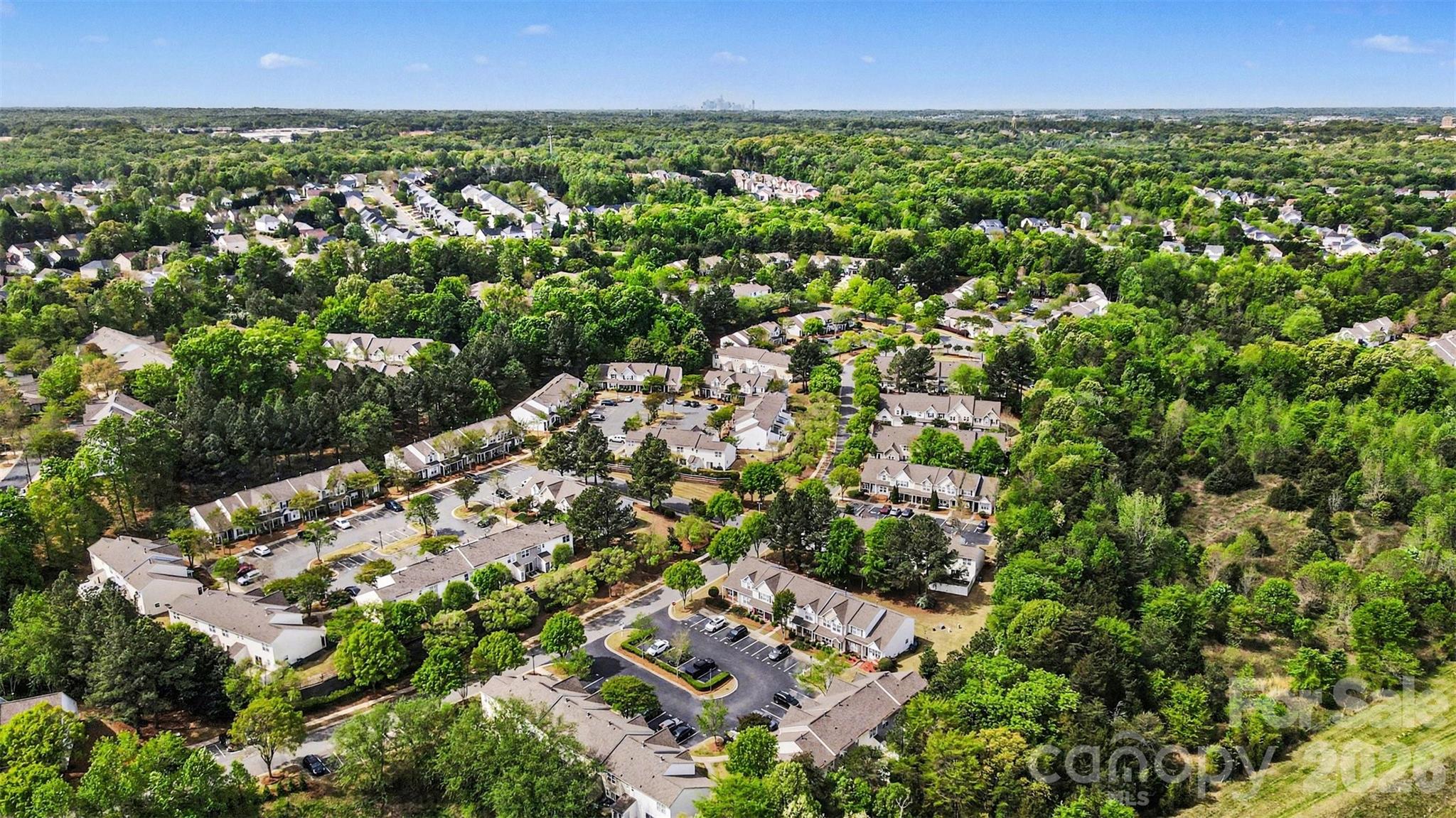 3201 Blythe Ridge Court Charlotte, NC 28213 - Photo 32 of 34 an aerial view of residential houses with outdoor space and trees all around