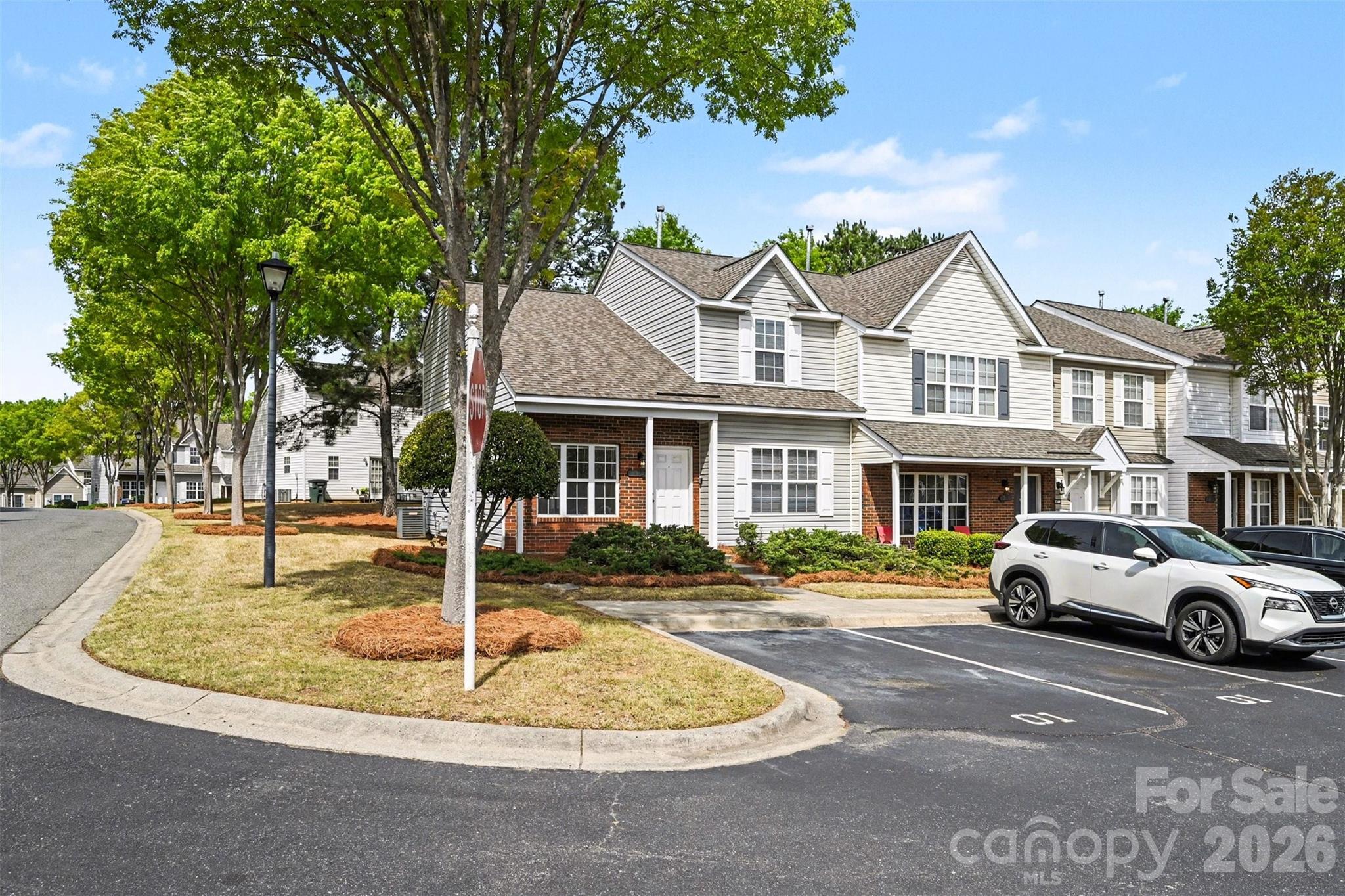 3201 Blythe Ridge Court Charlotte, NC 28213 - Photo 4 of 34 a front view of a house with a yard