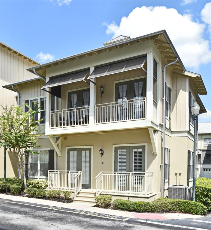 601 Edwards Street, Unit 4204 Celebration, FL 34747 - Photo 1 of 1 a front view of a house with a yard