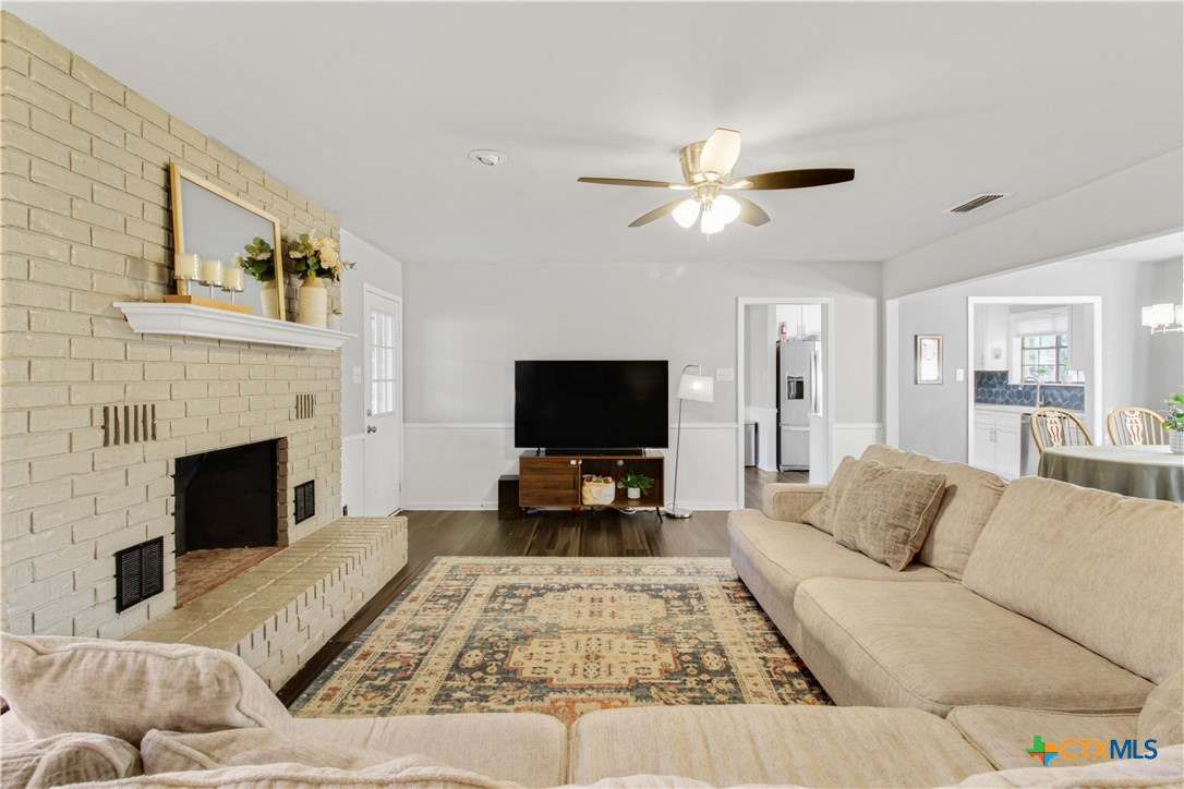 4314 Fox Trail Temple, TX 76504 - Photo 5 of 22 a living room with furniture and a fireplace