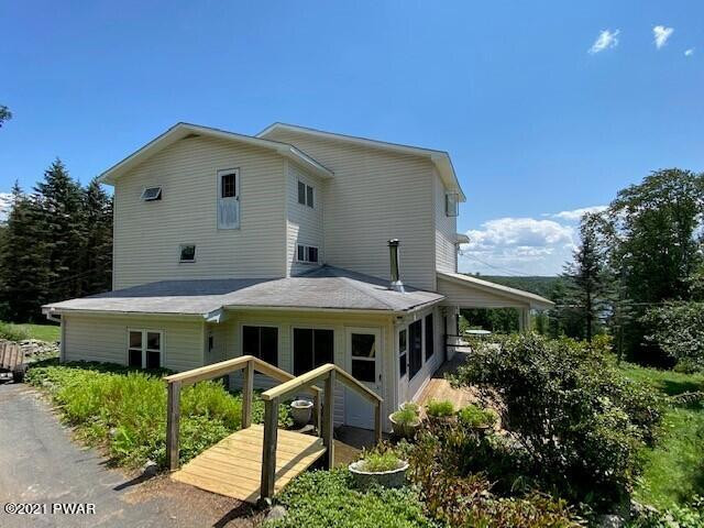 93 Miller Road Beach Lake, PA 18405 - Photo 50 of 53 a aerial view of a house with a yard