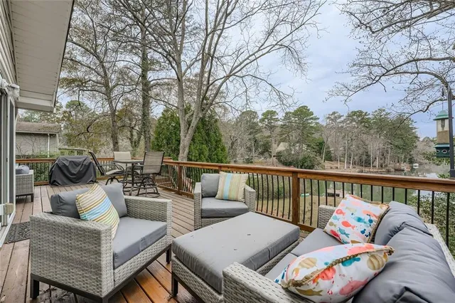 a view of a house with a yard and garage
