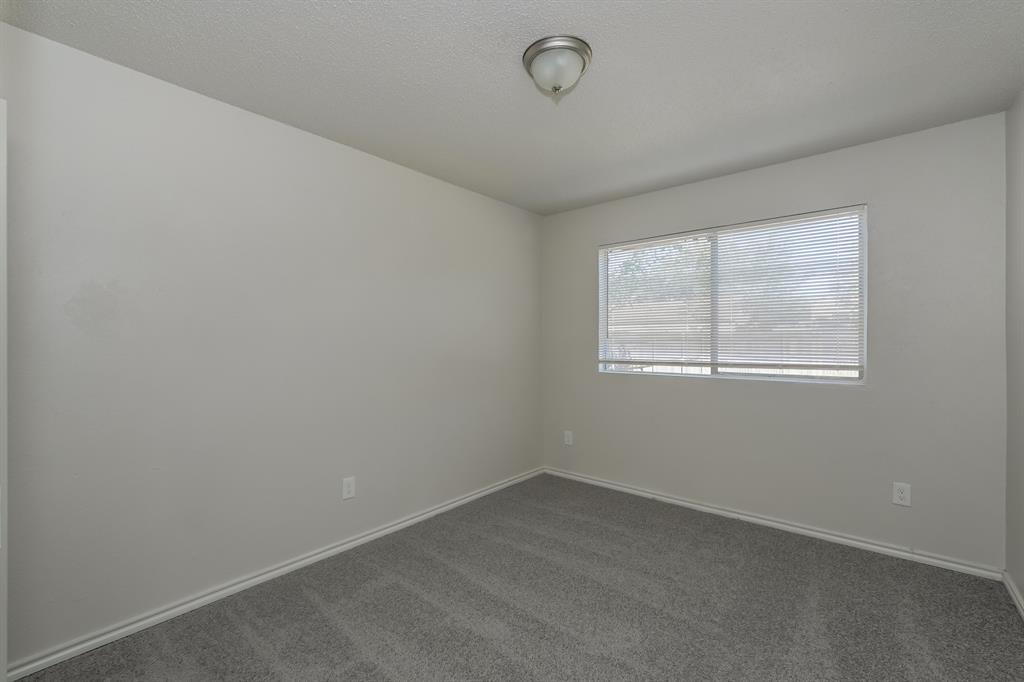 3805 Big Leaf Lane Fort Worth, TX 76137 - Photo 12 of 16 an empty room with a window