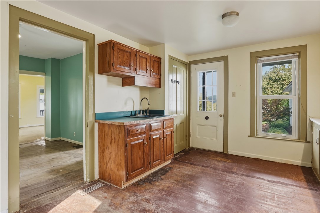 5 Powderhouse Road Corning, NY 14830 - Photo 5 of 47 Hardwood floors and classic wood cabinetry enrich