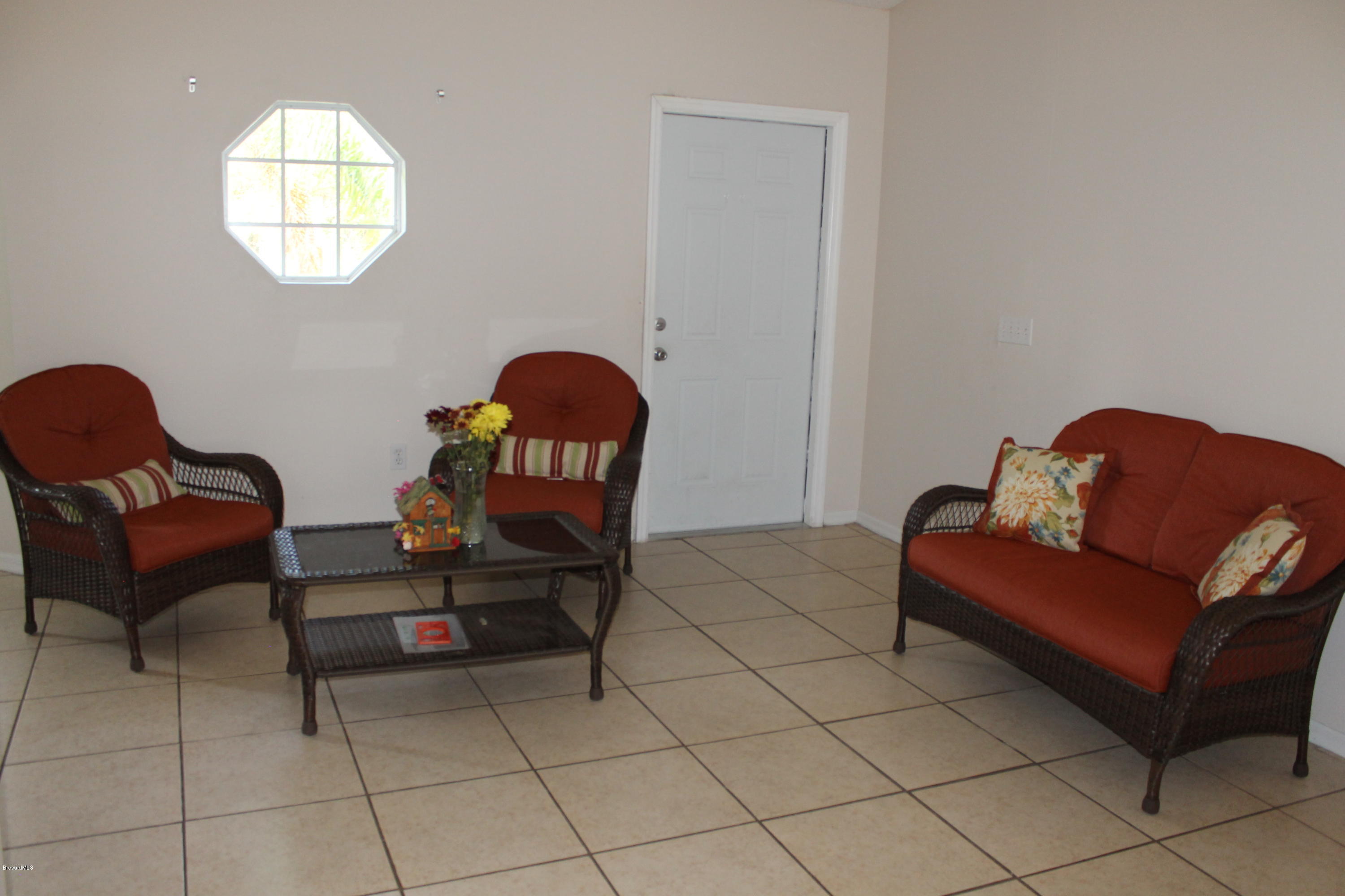 1190 Tupelo Road Southwest Palm Bay, FL 32908 - Photo 13 of 25 Formal Living Room