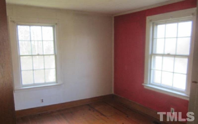 7866 Oxford Road Rougemont, NC 27572 - Photo 11 of 19 an empty room with a window