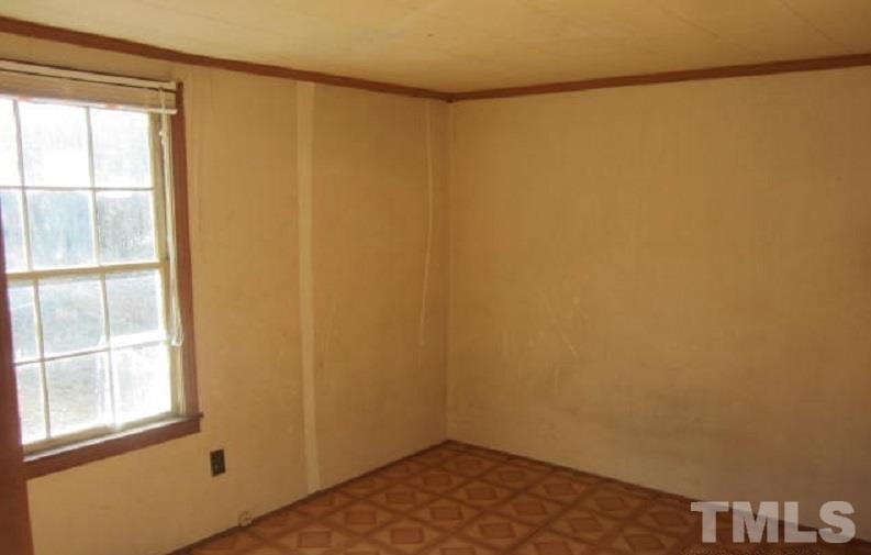 7866 Oxford Road Rougemont, NC 27572 - Photo 13 of 19 a small space with a window in it