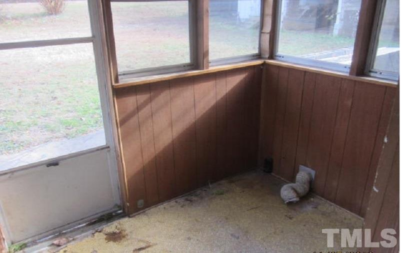 7866 Oxford Road Rougemont, NC 27572 - Photo 16 of 19 a view of an empty room and window