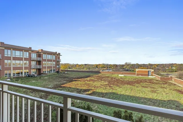 a view of lake with balcony