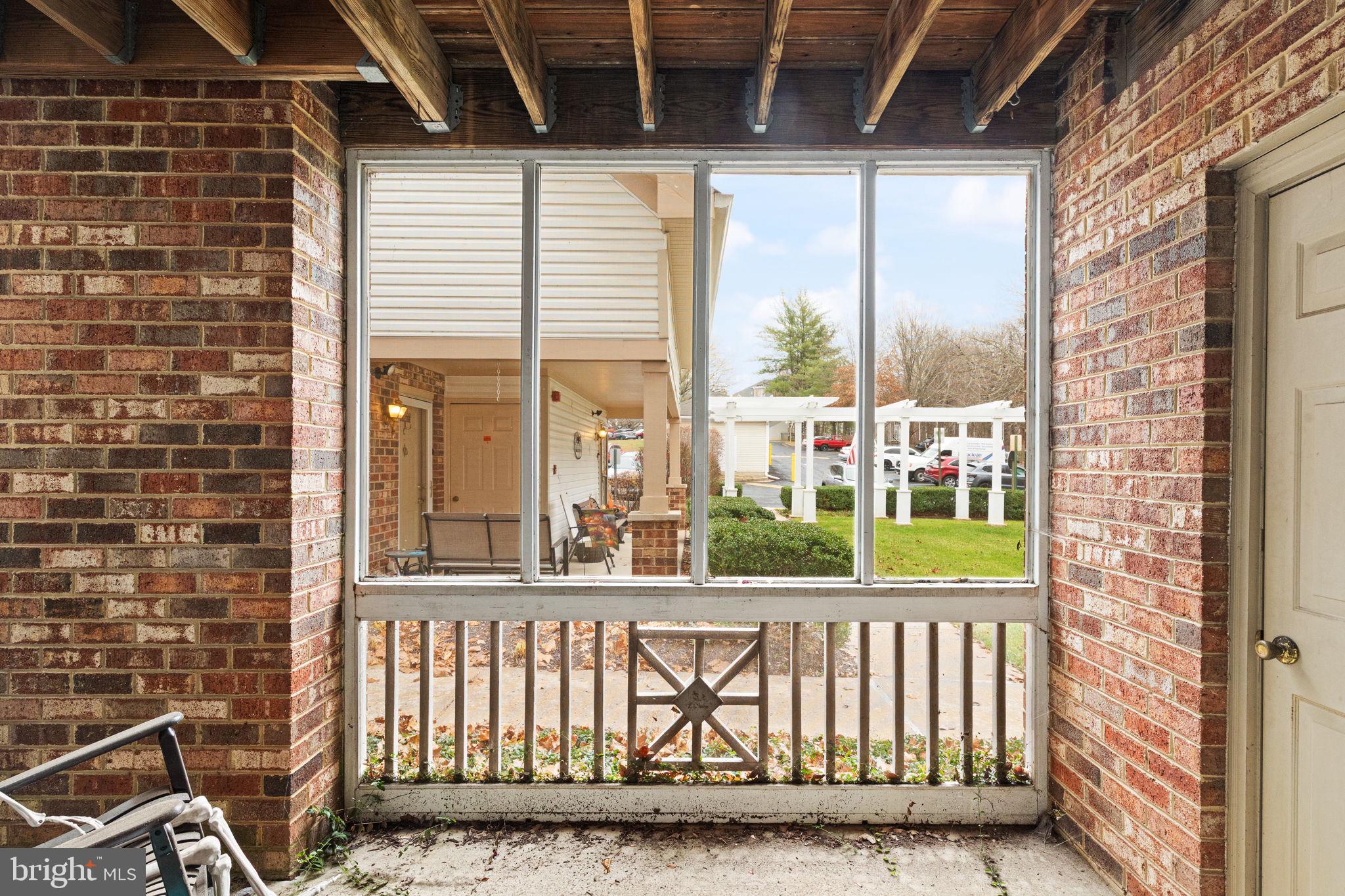 608 Churchill Road, Unit 608E Bel Air, MD 21014 - Photo 20 of 25 a view of a porch with a floor to ceiling window