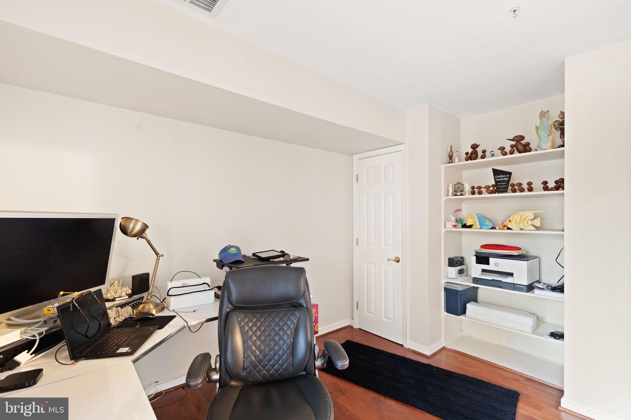 608 Churchill Road, Unit 608E Bel Air, MD 21014 - Photo 10 of 25 a workspace with furniture and wooden floor