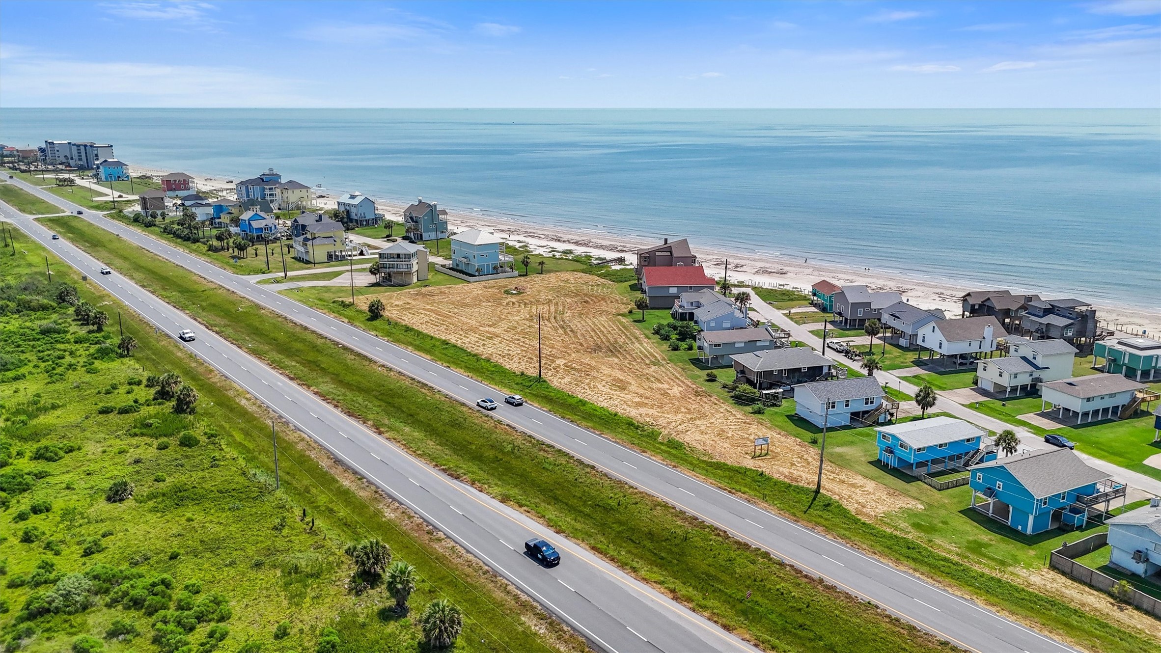 12223 Termini-San Luis Pass Road Galveston, TX 77554 - Photo 16 of 17 a view of a city from a balcony
