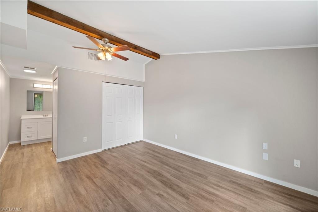 17568 Lee Road Fort Myers, FL 33967 - Photo 9 of 22 wooden floor in an empty room