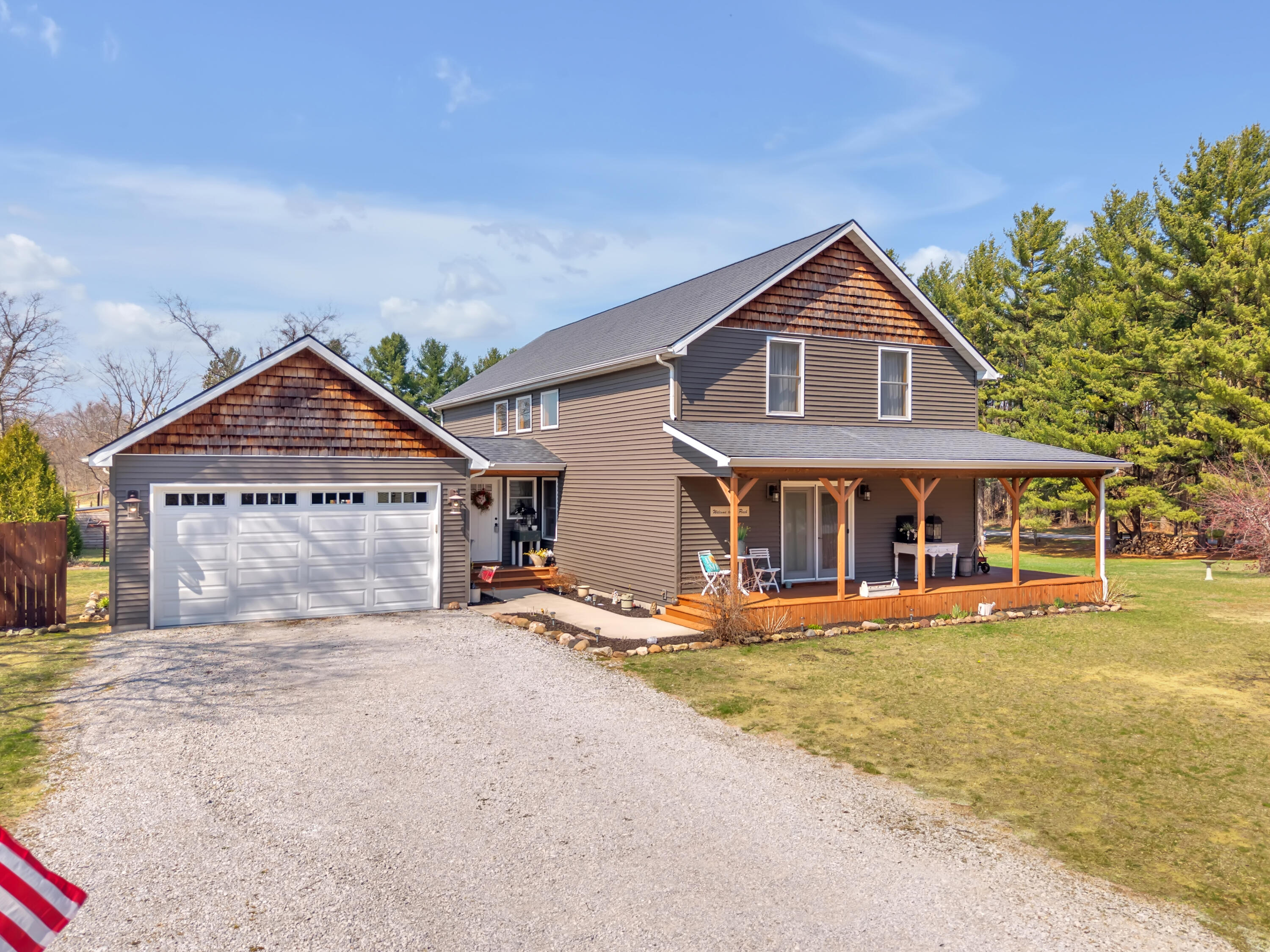 9960 Wildwood Place Demotte, IN 46310 - Photo 2 of 36 a front view of a house with a yard