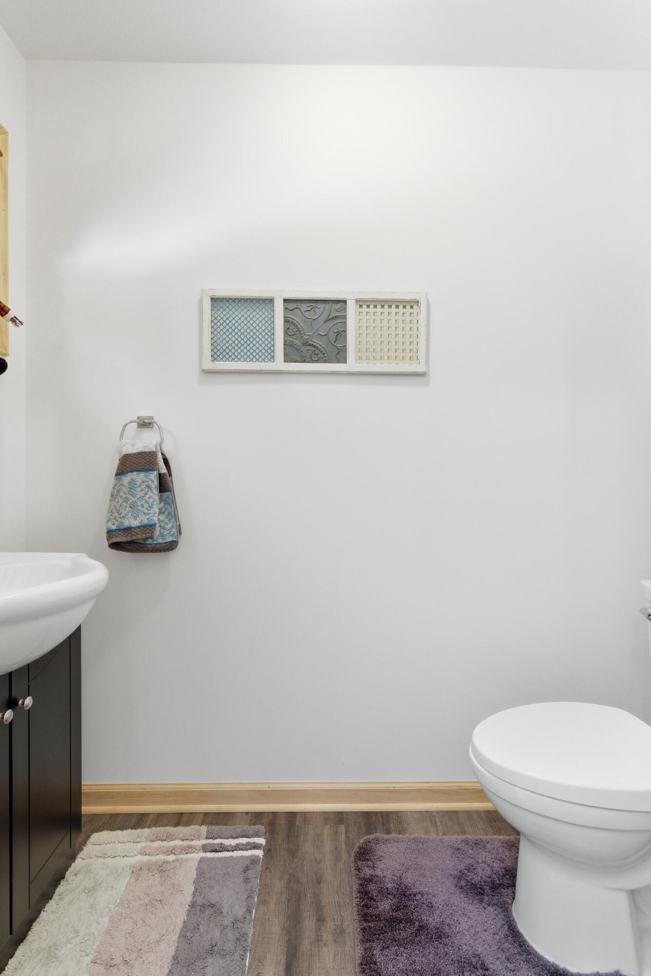 9960 Wildwood Place Demotte, IN 46310 - Photo 24 of 36 a bathroom with a toilet
