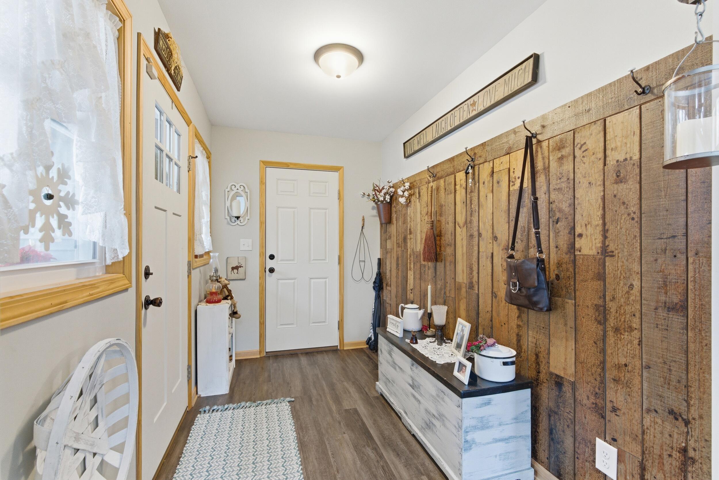 9960 Wildwood Place Demotte, IN 46310 - Photo 5 of 36 a bathroom with a bathtub and shower