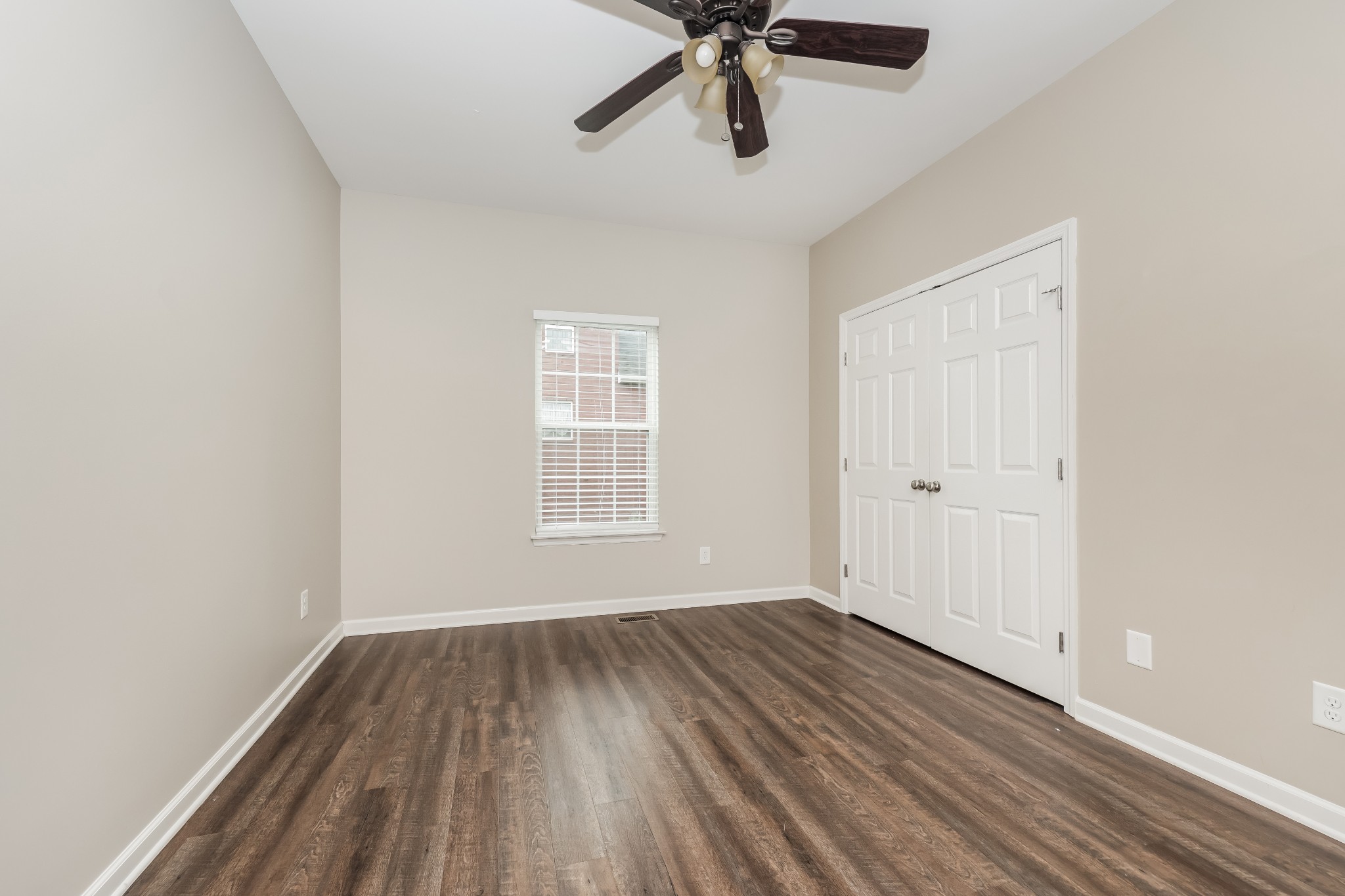 106 Abbey Road Lebanon, TN 37090 - Photo 11 of 17 wooden floor in an empty room with a window