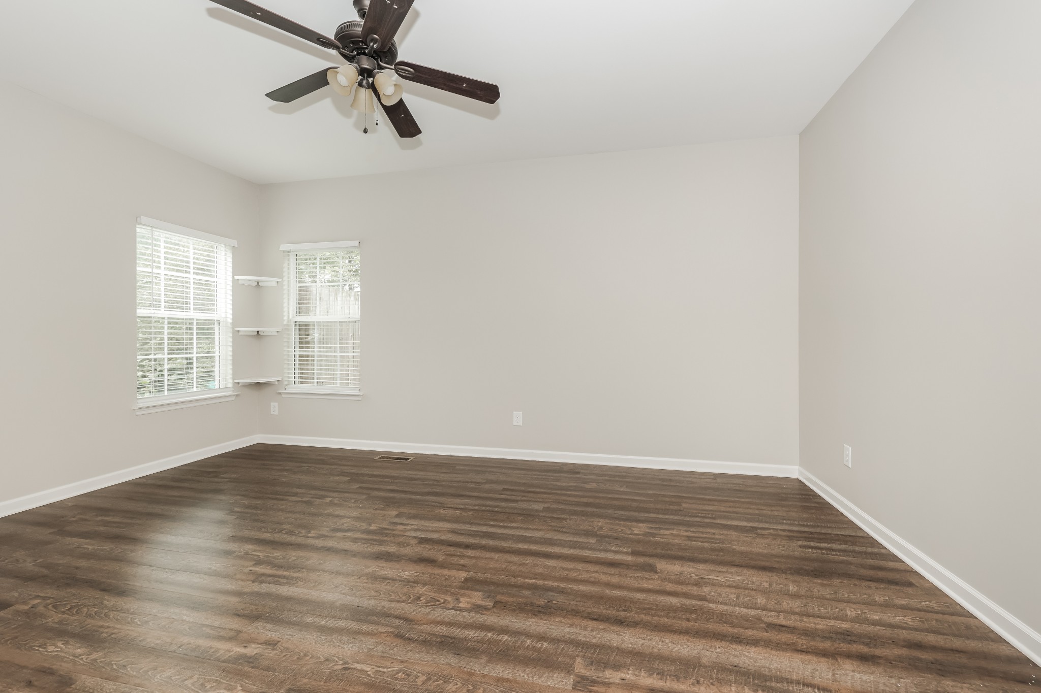 106 Abbey Road Lebanon, TN 37090 - Photo 12 of 17 wooden floor in an empty room with a window