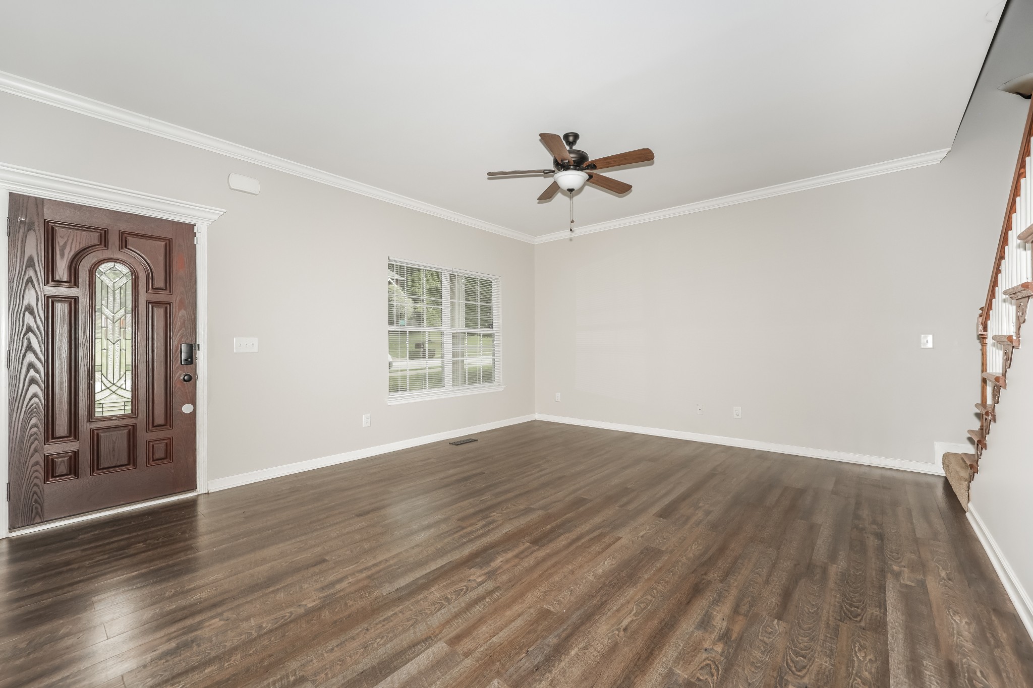 106 Abbey Road Lebanon, TN 37090 - Photo 3 of 17 a view of empty room with wooden floor and fan